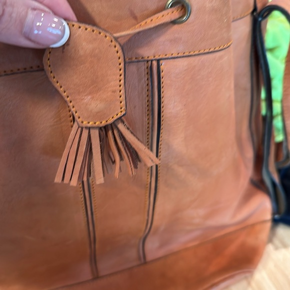 Genuine leather cognac colored bucket shoulder bag with cinch close. - Picture 3 of 5